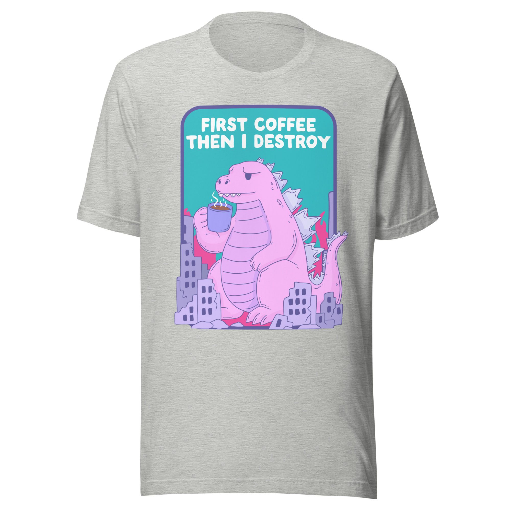 First Coffee Then I Destroy t-shirt featuring a cartoon kaiju sipping coffee while destroying a city.