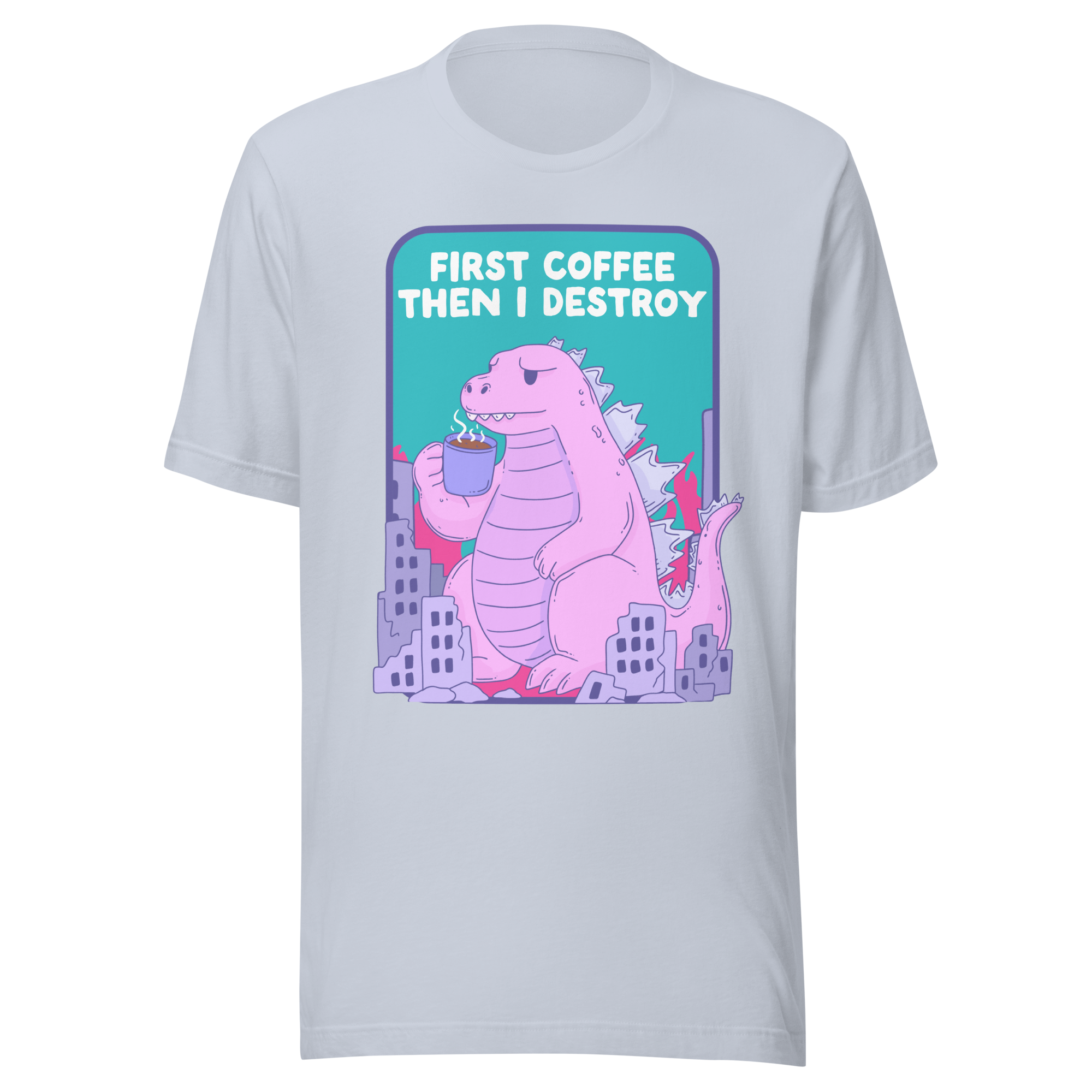 First Coffee Then I Destroy t-shirt featuring a pastel kaiju sipping coffee among destroyed buildings.